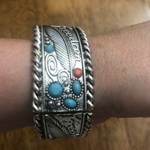 Gorgeous pieces of art on a brazalete.